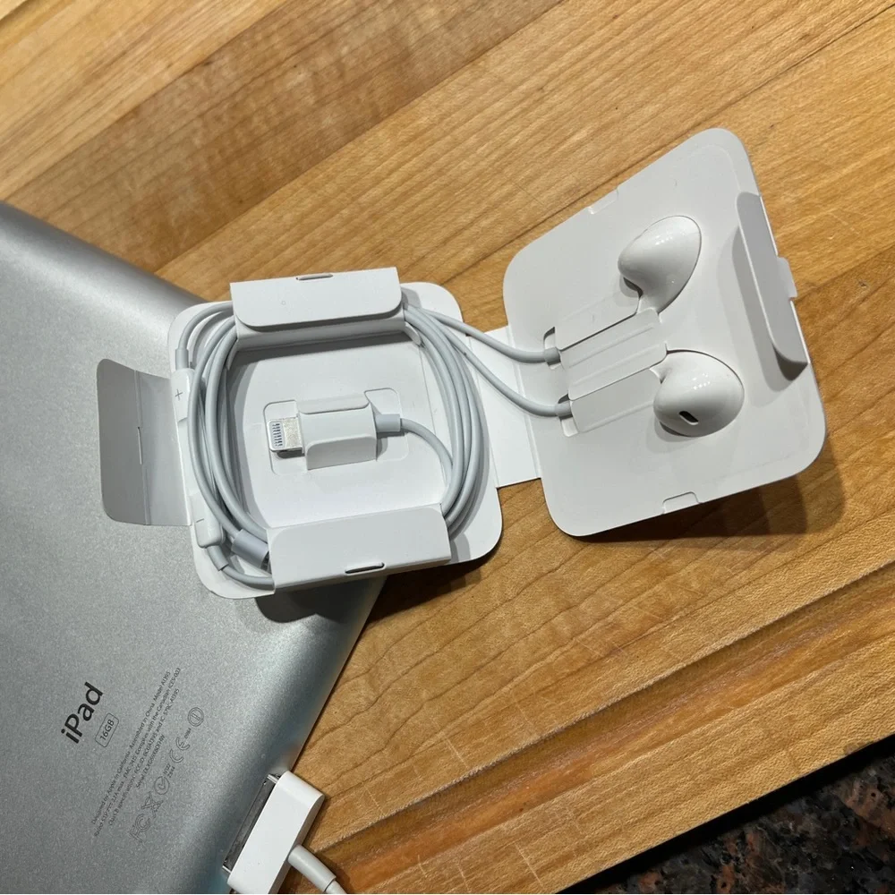 iPad 2 w/headphones & cable